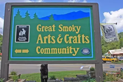 arts and crafts community sign